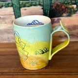 Monsoon Graffiti Mugs by Connected Earth Clay and Art Works