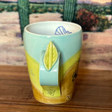 Monsoon Graffiti Mugs by Connected Earth Clay and Art Works